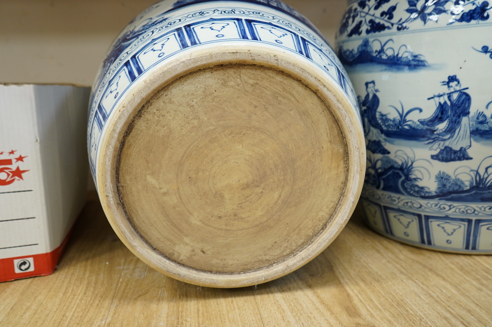 A large pair of Chinese blue and white planters, 43cm high.
